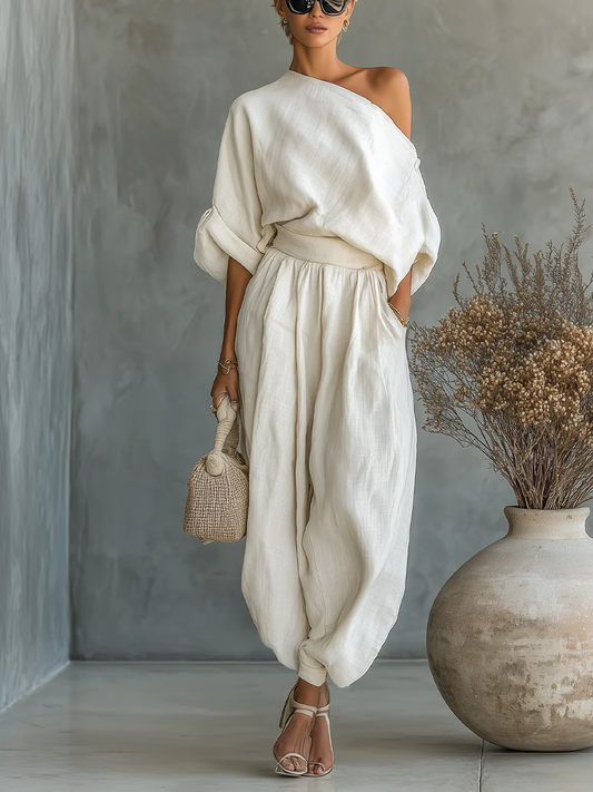 Capri | Conjunto crema de un hombro y pantalón fluido - LolaLenz™
